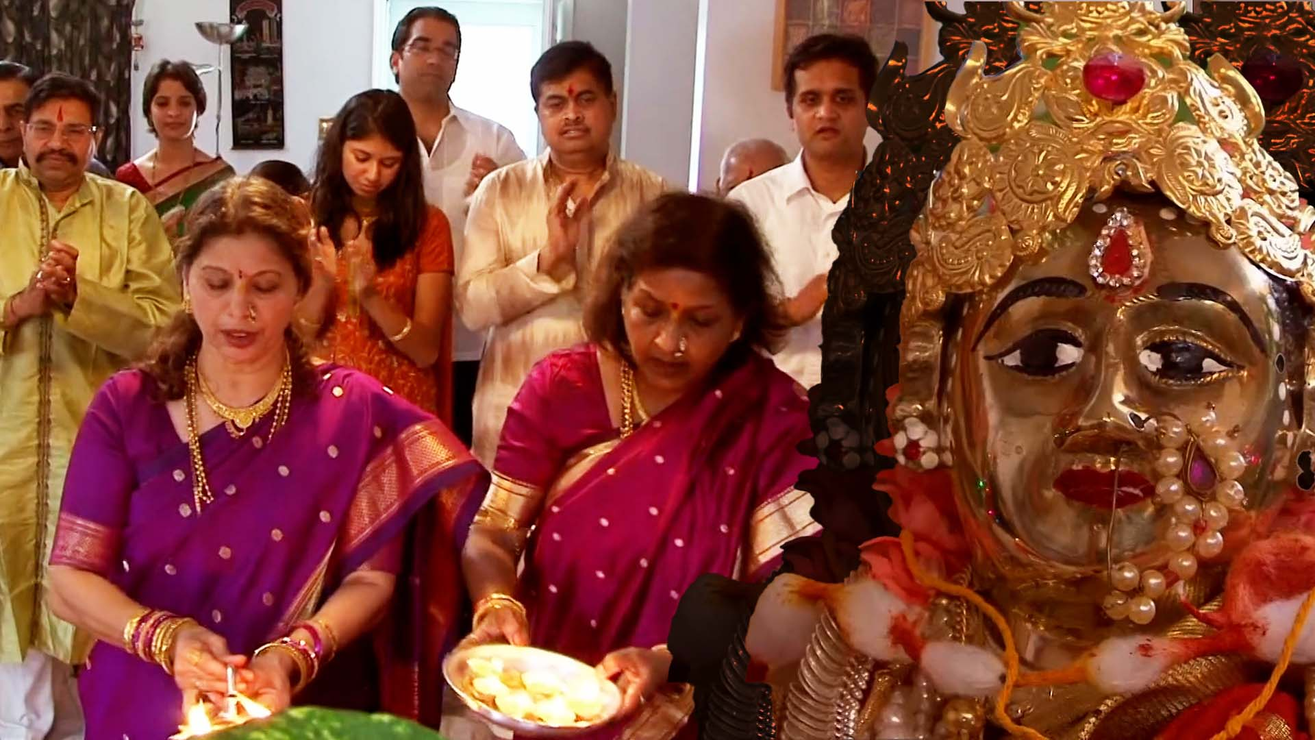 A picture of a Hindu family celebrating at home.